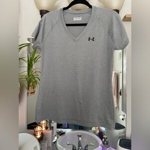 Two women’s Under Armour tees